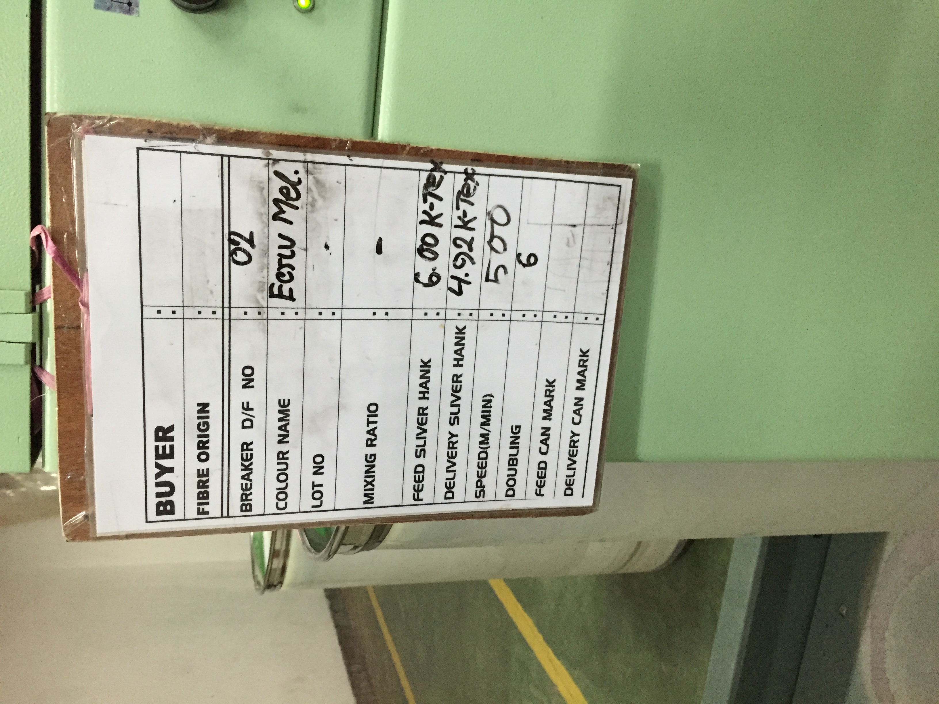 A handwritten machine record illustrating the paper-based information practices encountered during fieldwork.