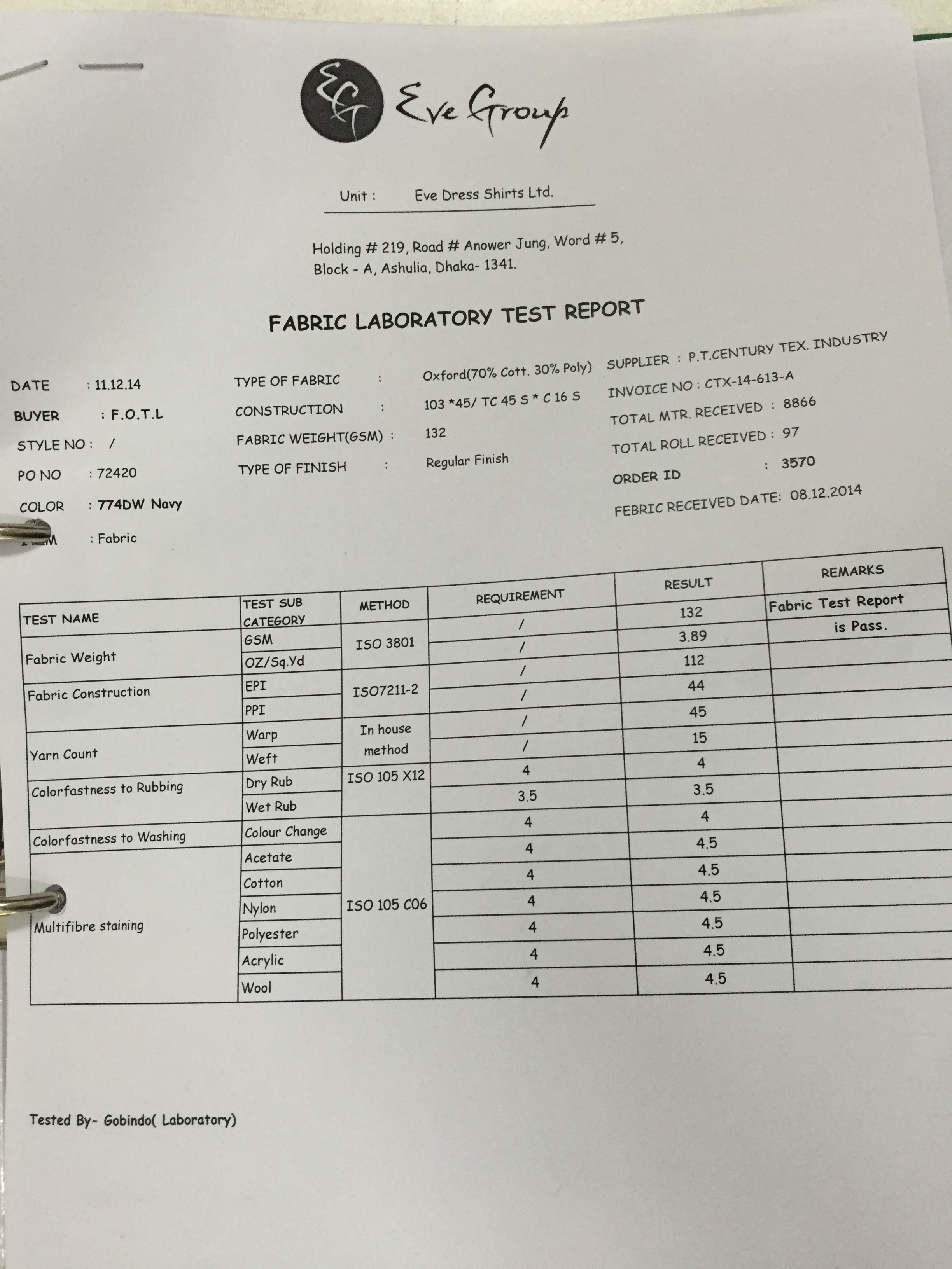 A paper fabric laboratory report: material, order, and quality information held in a physical document.